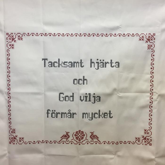 Bild 1,  Broderad väggbonad 
